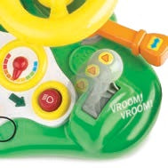 John Deere Busy Driver tractor dashboard toy, close up of the wheel, John Deere, Hinterland